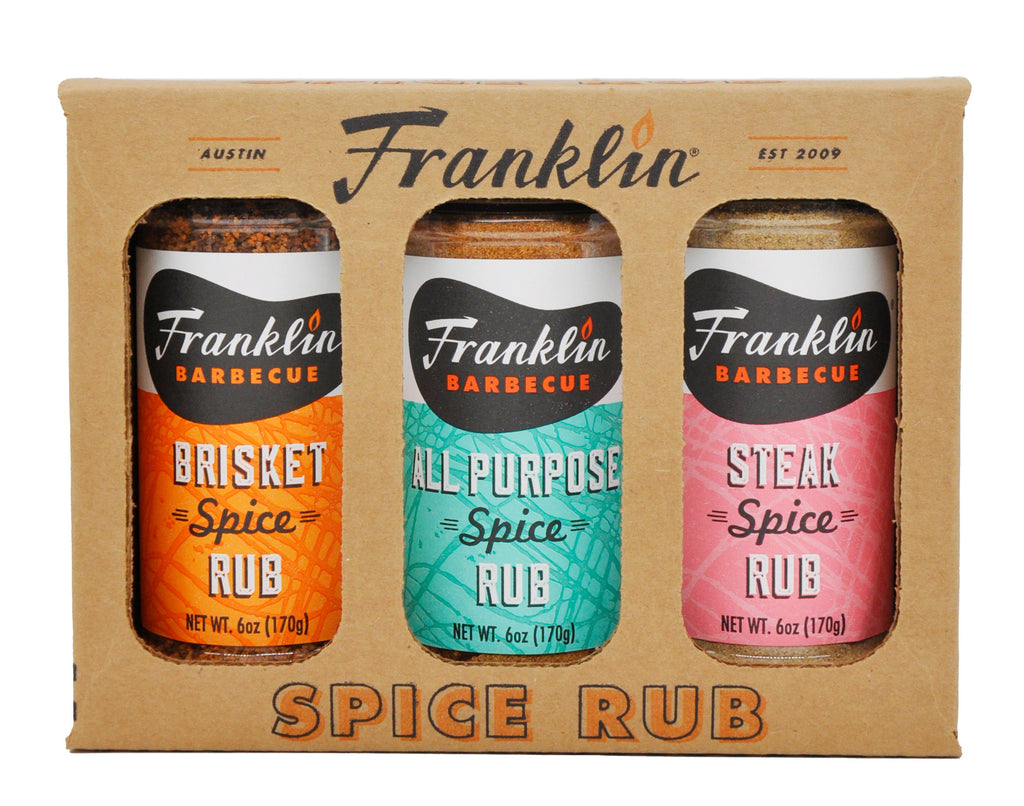 Three bottles of Franklin Barbecue Spice Rub in a cardboard packaging on a white background