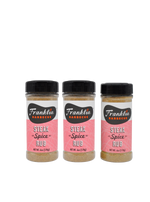 Three bottles of Franklin Barbecue Steak Spice Rub on a white background