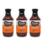 Three bottles of Franklin Barbecue Original Texas BBQ Sauce arranged side by side on a white background.