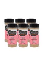 Six jars of Franklin Barbecue Steak Spice Rub on a white background
