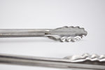 Detail of Franklin Barbecue Beefy Tongs scalloped edge 