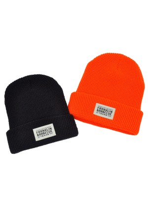 black and orange beanie with Franklin Barbecue Patch. 