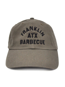 Olive color soft dad hat with FRANKLIN ATX BARBECUE black stitching in all caps.