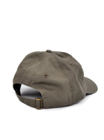 Back of olive colored soft dad hat with brass clasp