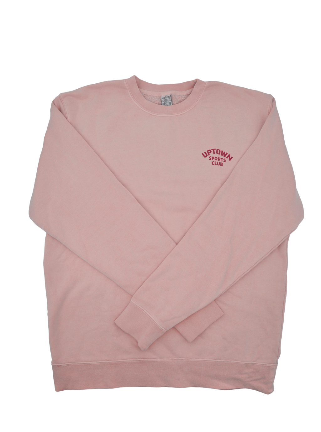 pink crewneck with Logo Uptown Sports Club on top left. 