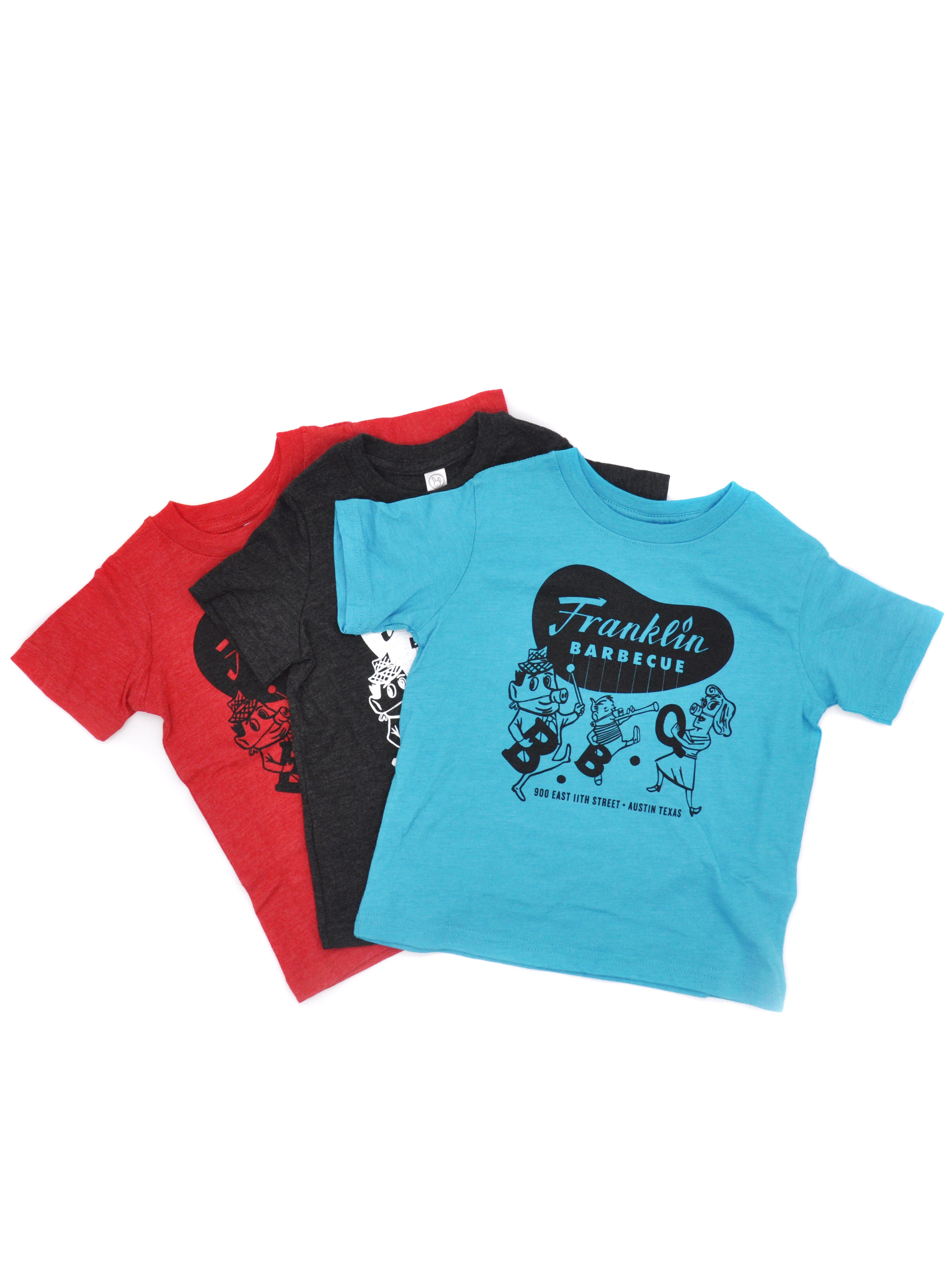 Franklin Barbecue kids t-shirts shown in red, grey, and teal.