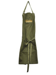 Green apron with stitched on Franklin Barbecue logo in gold 