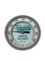 Close up on Thermometer with Franklin Barbecue Pits logo and Master the Craft Aus Tex in green