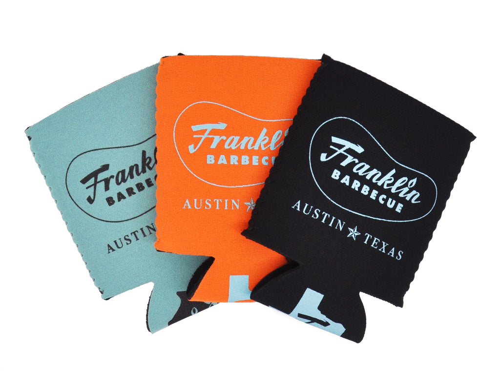 Coldie holdies with Franklin Barbecue logo printed on front. Seafoam blue with black logo, orange with blue logo and black with blue logo