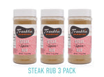 11.5 oz Steak Rub 3 pack with pink label and Franklin Barbecue bean logo in black with white and orange lettering