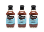 Trio of Franklin Barbecue Vinegar Sauce bottles.