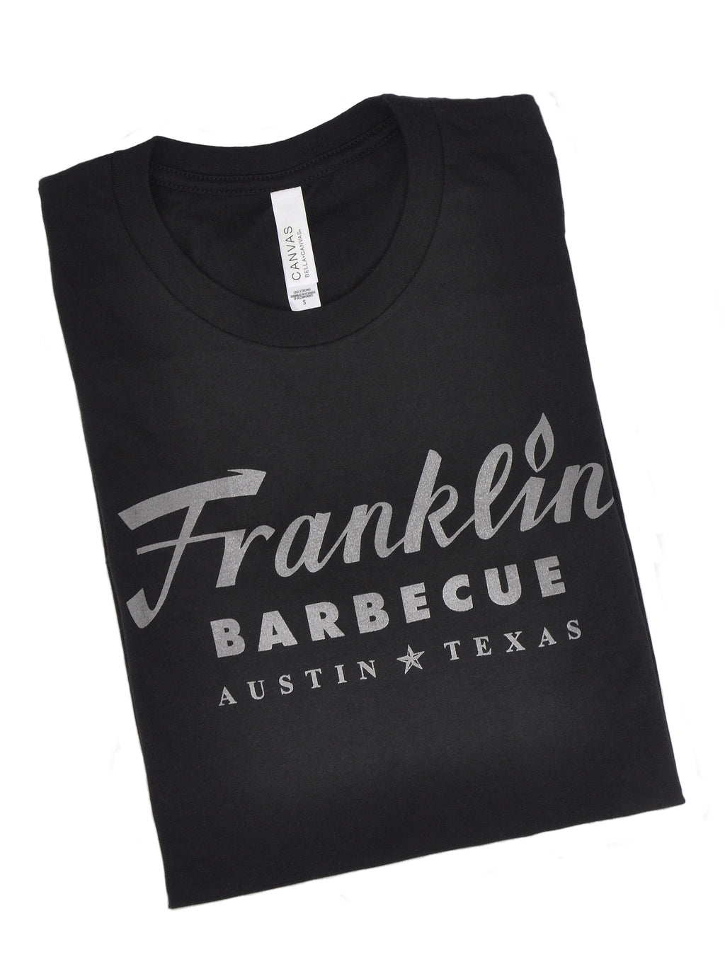 Black t-shirt with Franklin Barbecue text logo in dark silver metallic print.